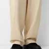 Pantaloni super larghi con piega