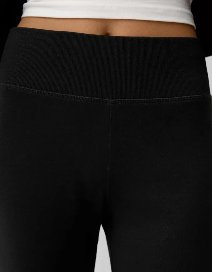 Pantaloni svasati in vita a costine