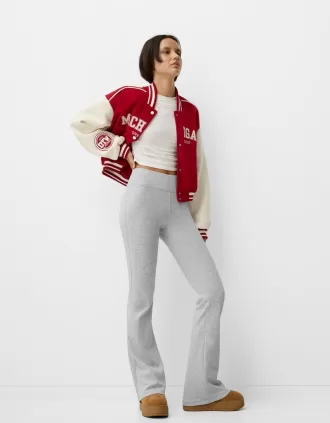 Pantaloni svasati in vita a costine