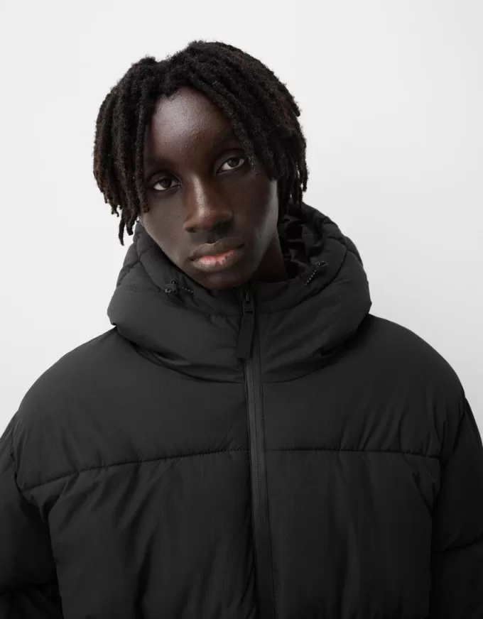 Piumino con cappuccio