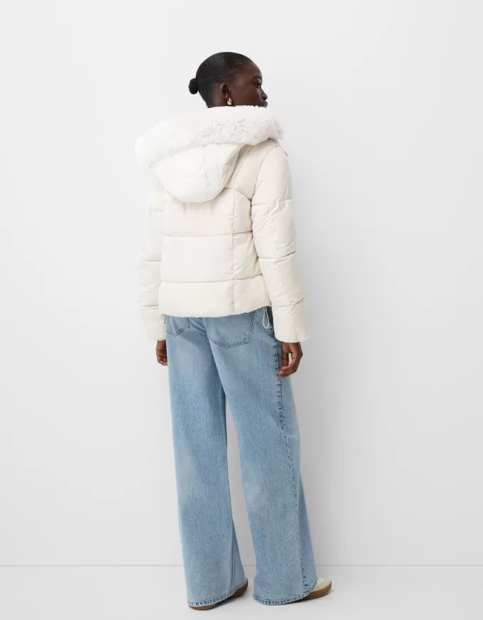 Piumino con cappuccio in pelliccia sintetica