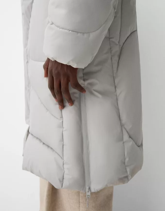 Piumino lungo con cappuccio