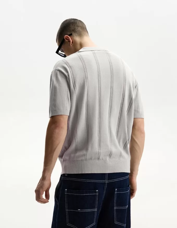 Polo testurizzata a maniche corte