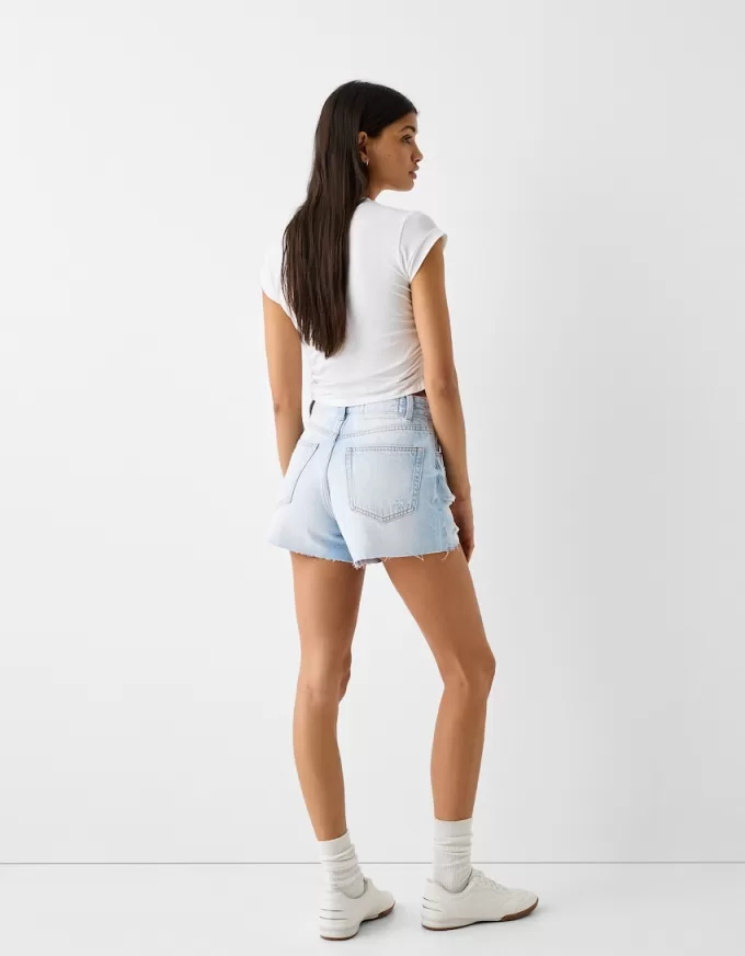 Shorts in denim strappati