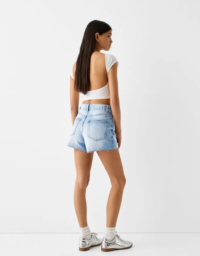 Shorts in denim strappati