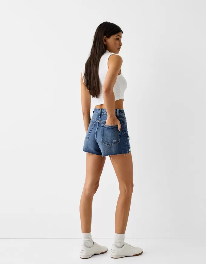 Shorts in denim strappati