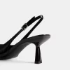 Slingback con tacco gattino
