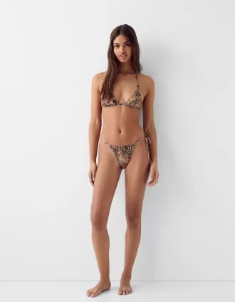 Slip bikini con stampa animalier annodata Slip bikini con stampa animalier annodata