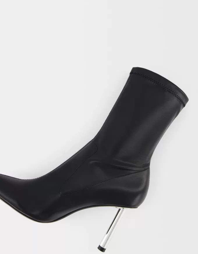 Stivaletti aderenti metallici con tacco alto