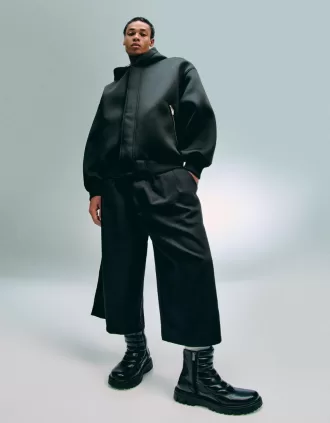 Stivaletti con plateau e fibbie