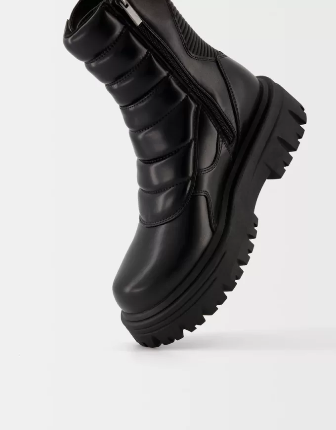 Stivaletti con plateau e fibbie