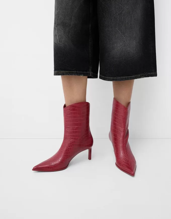 Stivaletti con tacco con stampa animalier in rilievo