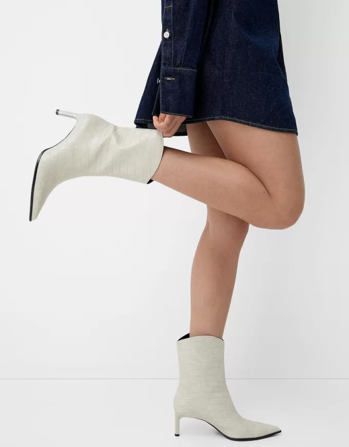 Stivaletti con tacco con stampa animalier in rilievo