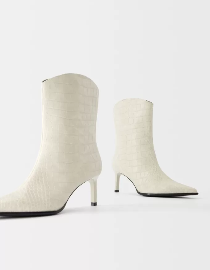 Stivaletti con tacco con stampa animalier in rilievo