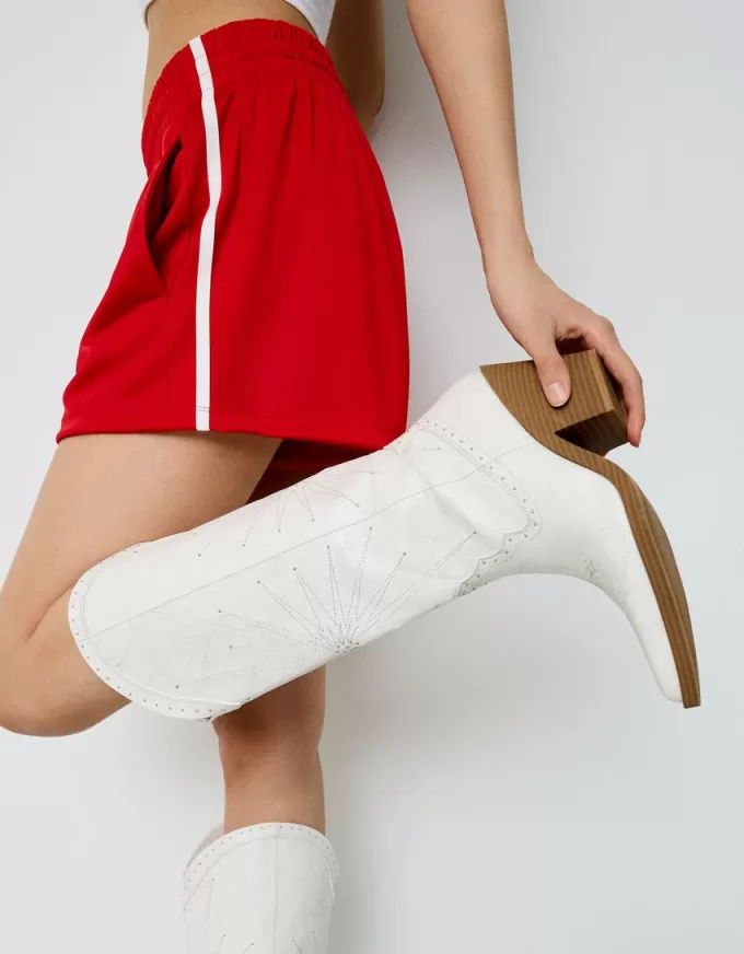 Stivali da cowboy con tacco alto e dettaglio borchiato