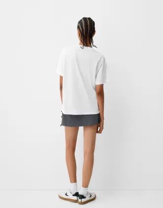 T-shirt Dua Lipa oversize a maniche corte