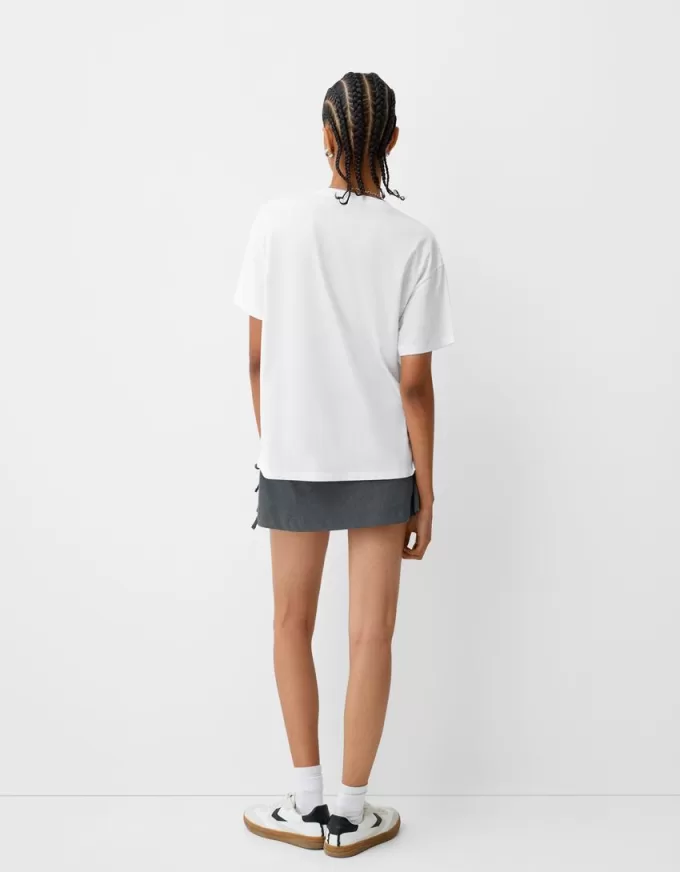 T-shirt Dua Lipa oversize a maniche corte