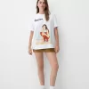 T-shirt Dua Lipa oversize a maniche corte