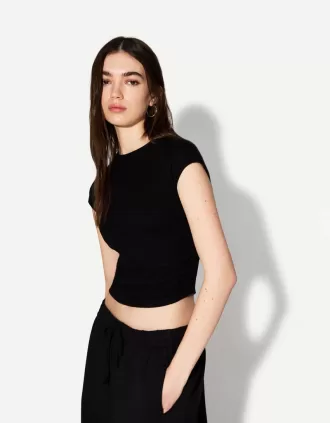 T-shirt a manica corta con arricciatura laterale