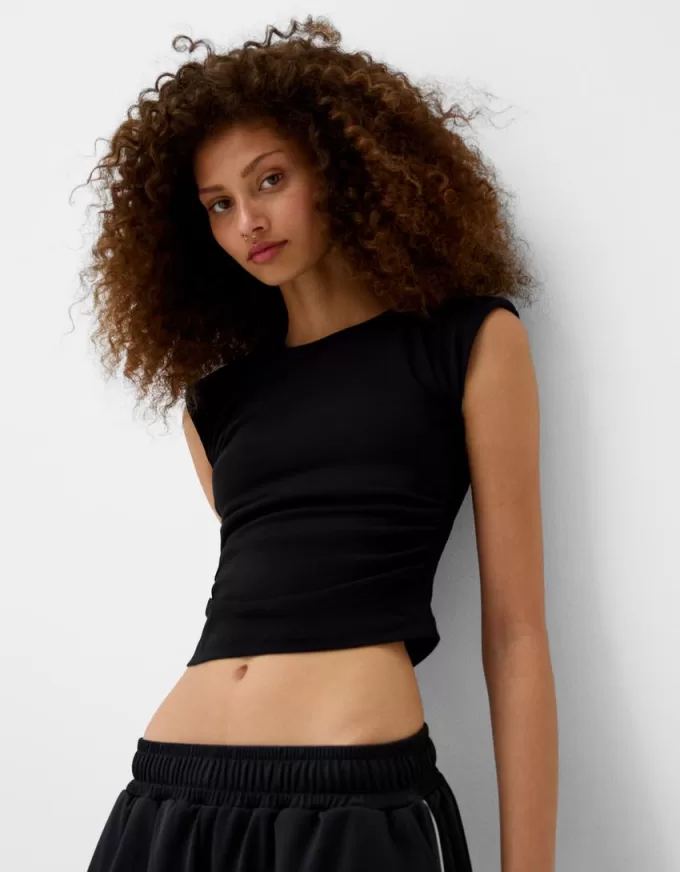 T-shirt a maniche corte con spalline