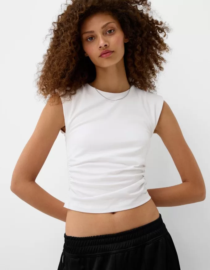 T-shirt a maniche corte con spalline