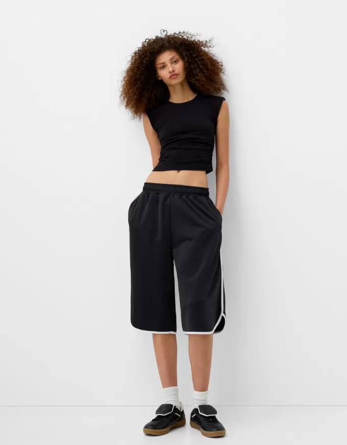 T-shirt a maniche corte con spalline