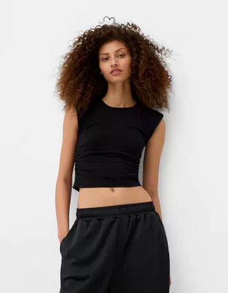 T-shirt a maniche corte con spalline