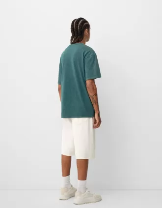 T-shirt a maniche corte effetto slavato con stampa