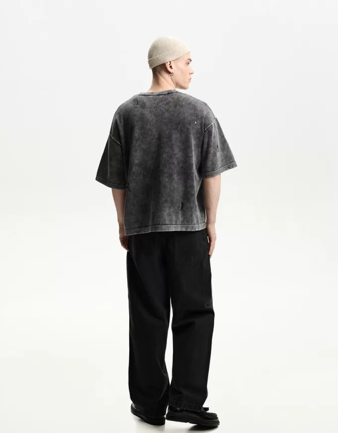 T-shirt a maniche corte strappata