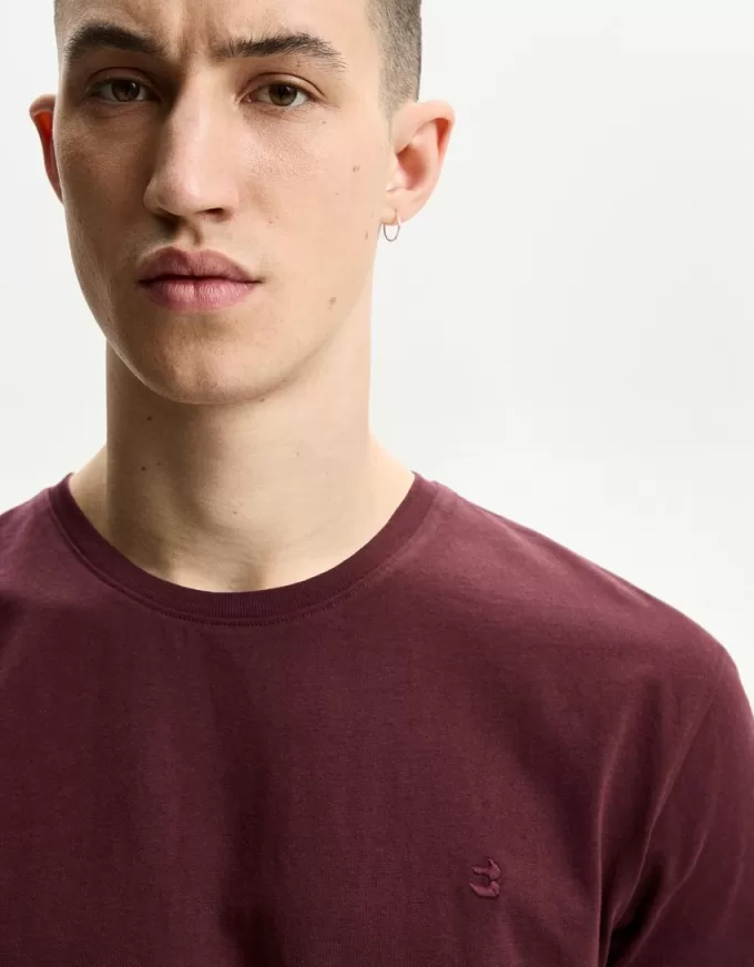 T-shirt arrotolata a maniche corte ricamata T-shirt arrotolata a maniche corte ricamata