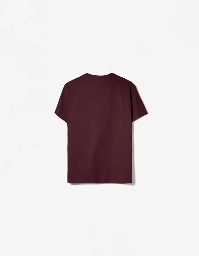 T-shirt arrotolata a maniche corte ricamata T-shirt arrotolata a maniche corte ricamata