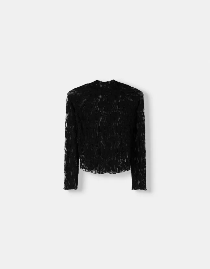 T-shirt bionda a maniche lunghe con collo alto in pizzo