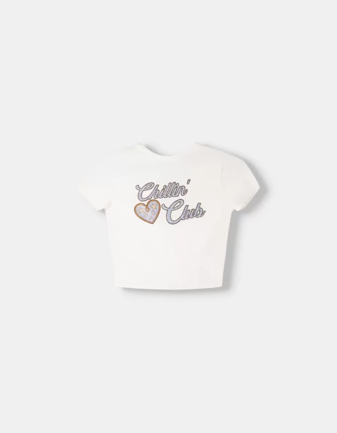 T-shirt con schiena scoperta e strass