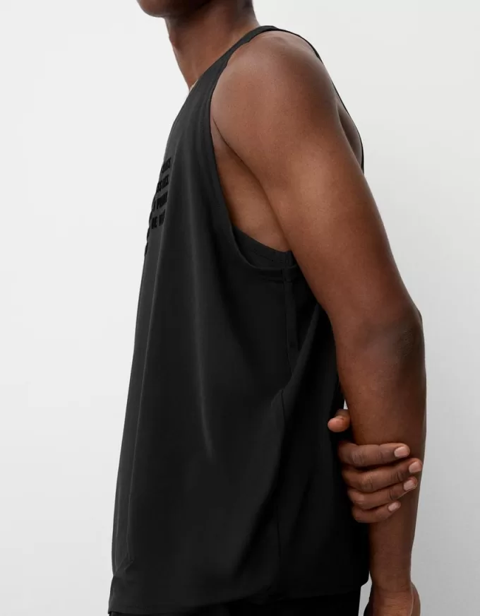 T-shirt con spalline a doppio strato