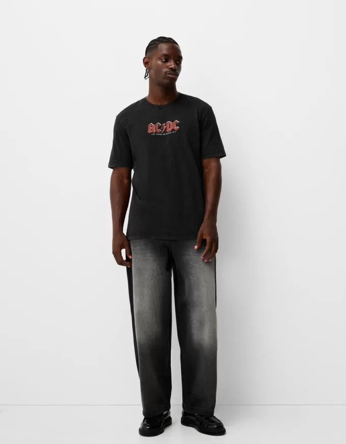 T-shirt con stampa AC/DC a maniche corte sbiadita
