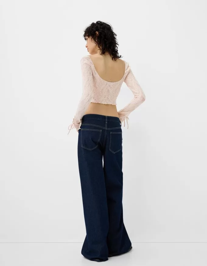 T-shirt in pizzo con fiocchi