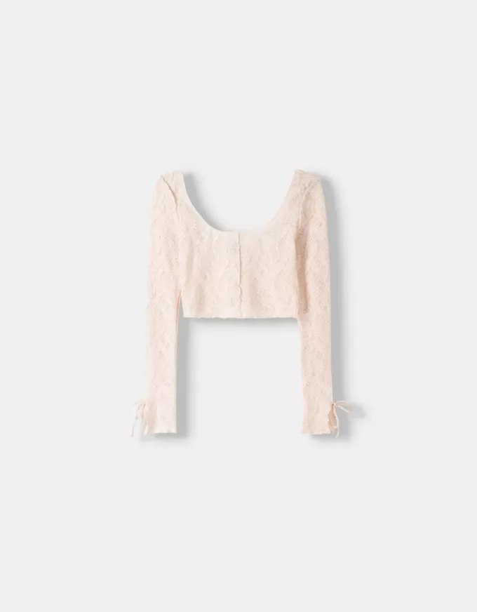 T-shirt in pizzo con fiocchi