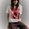 T-shirt oversize stampata a maniche corte