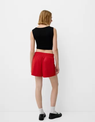 T-shirt senza maniche con scollo quadrato