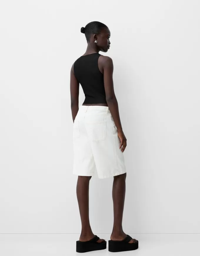 T-shirt senza maniche in tulle strass