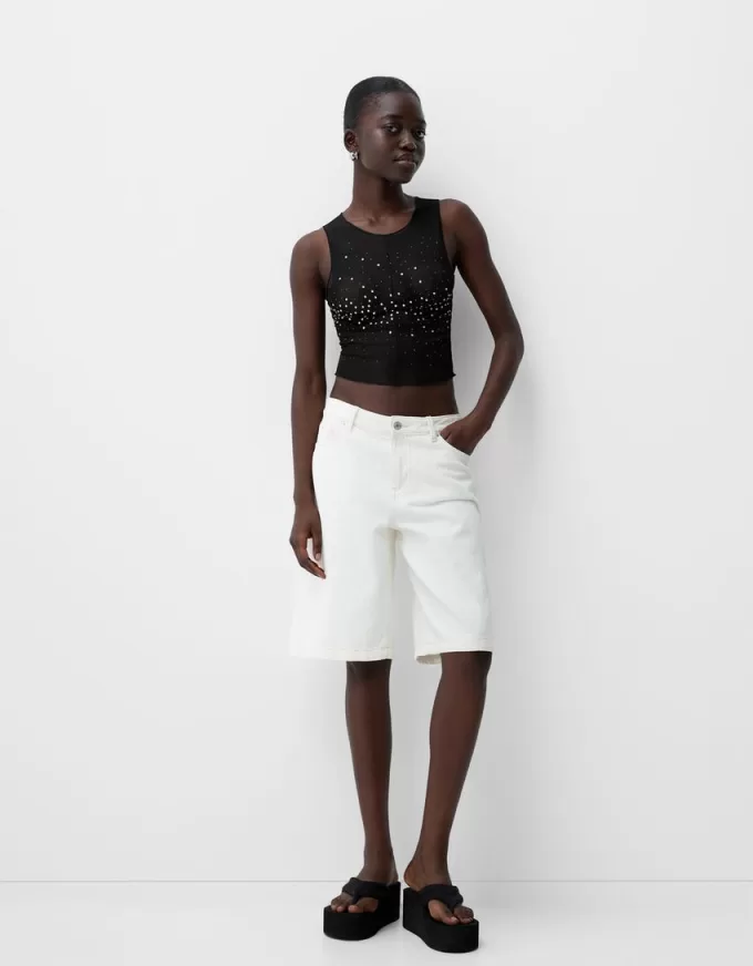 T-shirt senza maniche in tulle strass