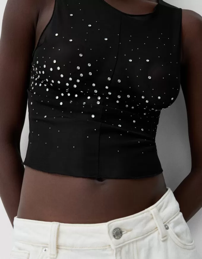 T-shirt senza maniche in tulle strass