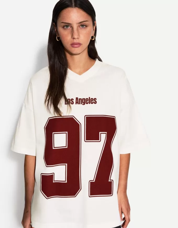 T-shirt stampata a maniche corte con scollo a V