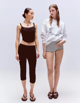 Top a corsetto con fiocchi