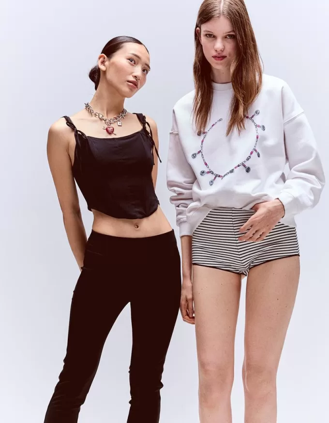 Top a corsetto con fiocchi