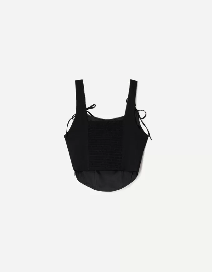 Top a corsetto con fiocchi