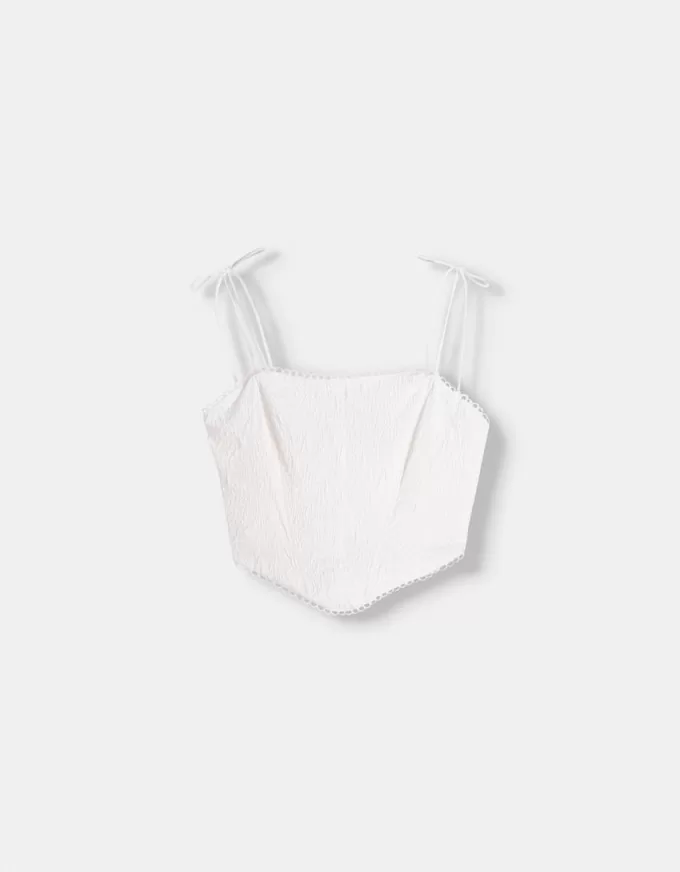 Top a corsetto jacquard