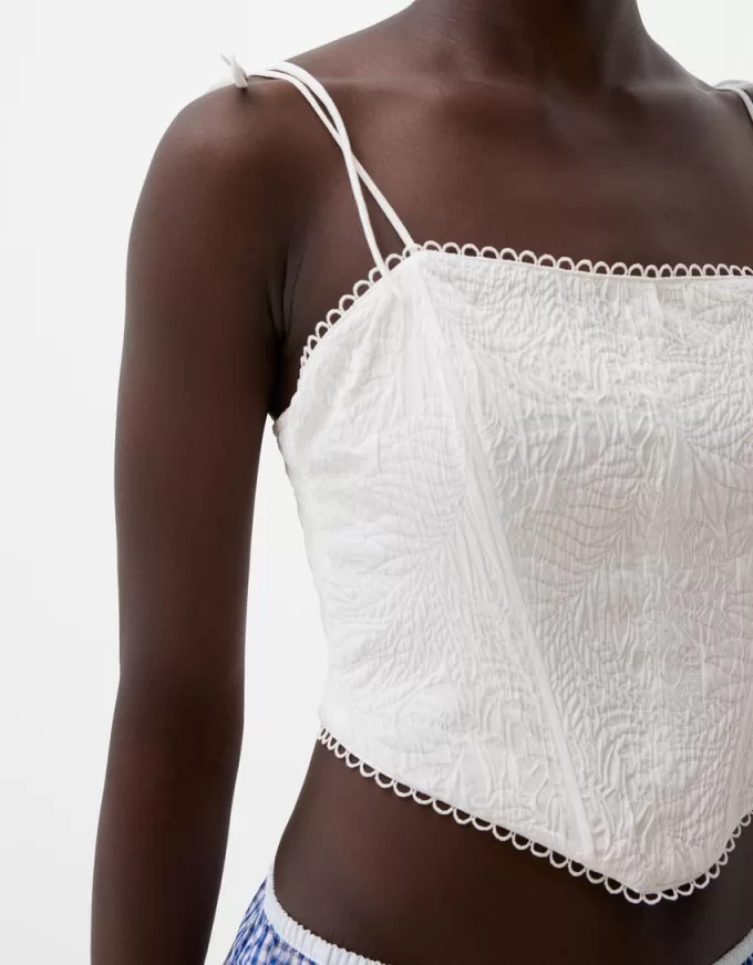 Top a corsetto jacquard