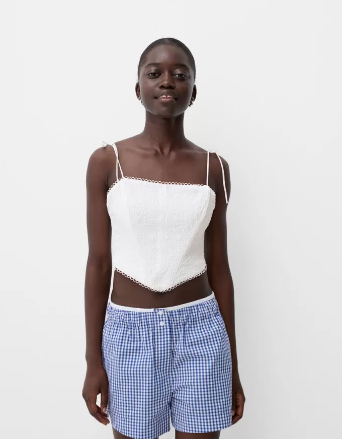 Top a corsetto jacquard