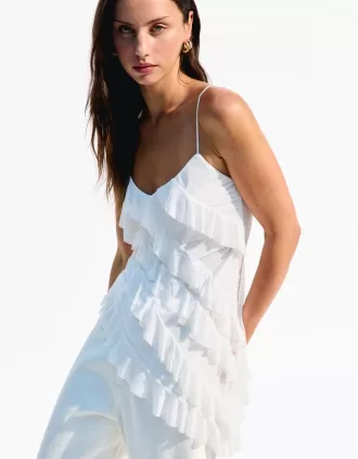 Top asimmetrico con volant SERIE BERSHKA